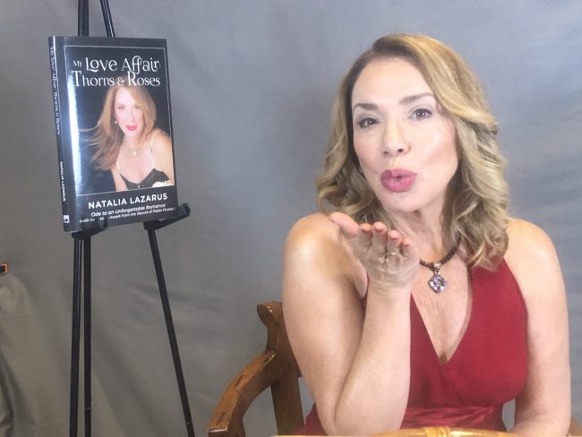 Natalia on book tour - blowing a kiss